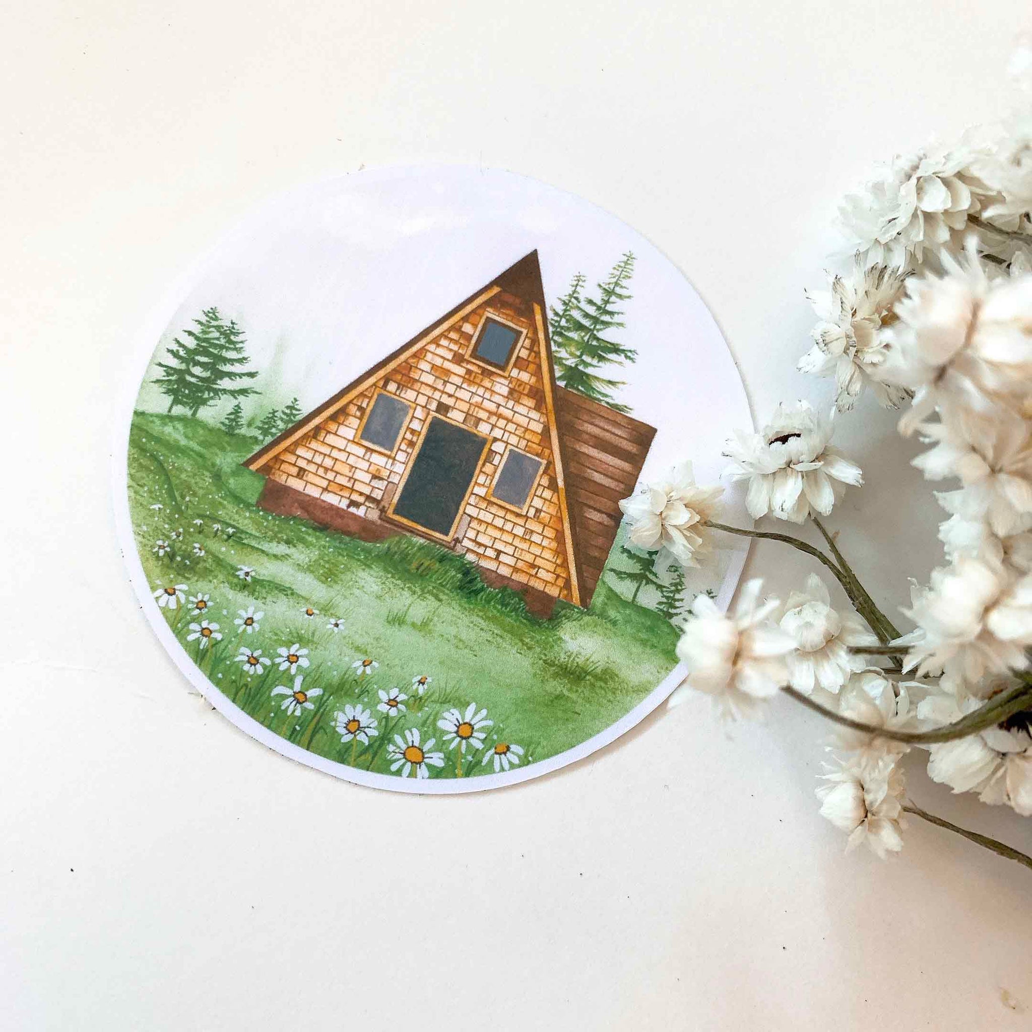 Cabin in a Field of Daisies Sticker
